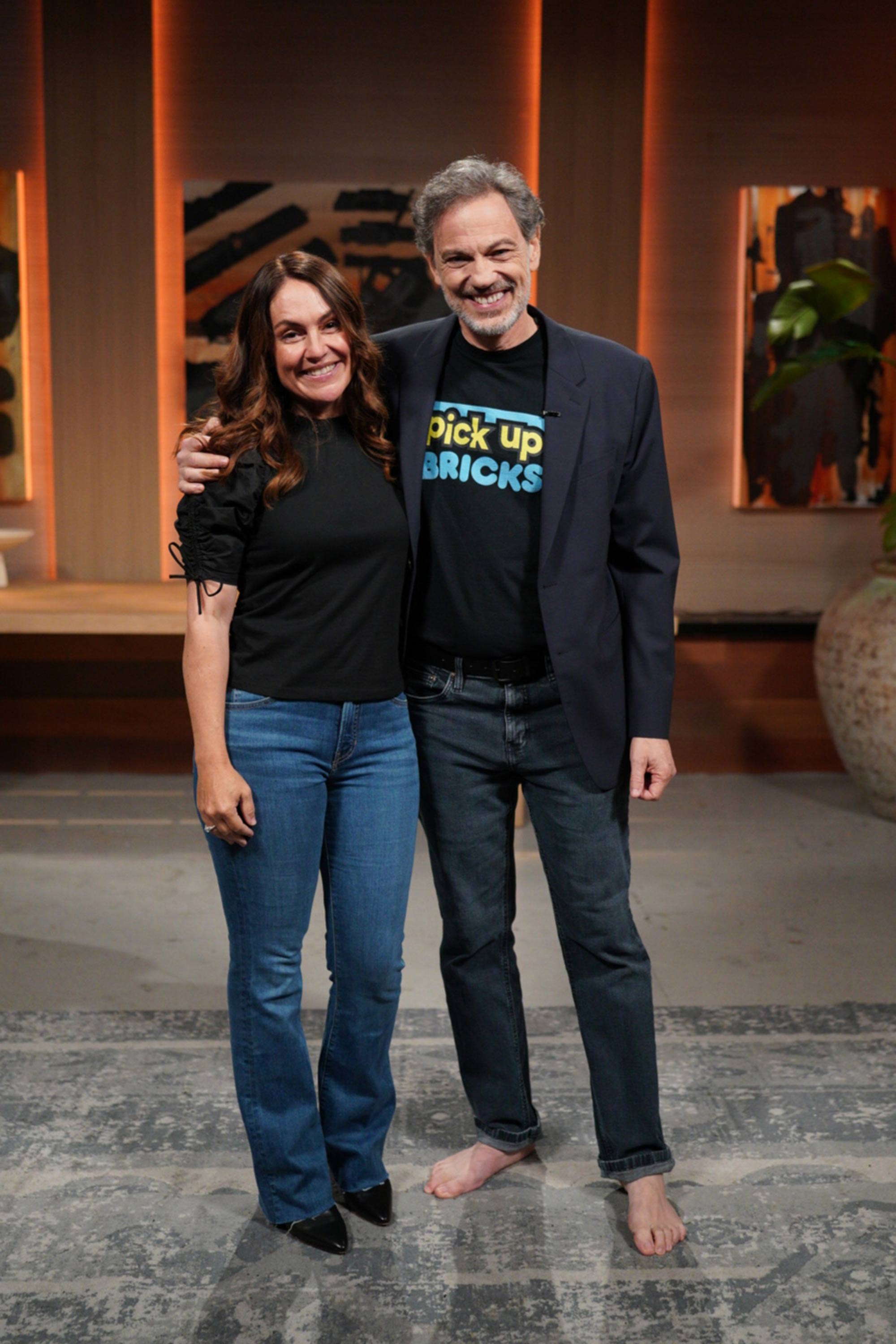 Aurora & Steve pose, smiling after their Shark Tank pitch